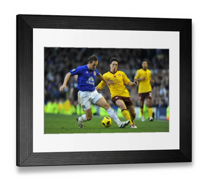 Framed Print : Jagielka vs. Nasri: Clash of the Titans at Goodison Park - Everton vs. Arsenal, Barclays Premier League (November 14, 2010) Framed Print : Jagielka vs. Nasri: Clash of the Titans at Goodison Park - Everton vs. Arsenal, Barclays Premier League (November 14, 2010)