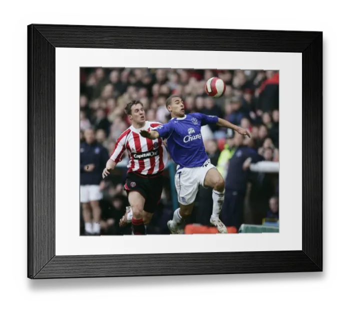 Framed Print : Sheffield United v Everton - James Vaughan in action against Phil Jagielka Framed Print : Sheffield United v Everton - James Vaughan in action against Phil Jagielka