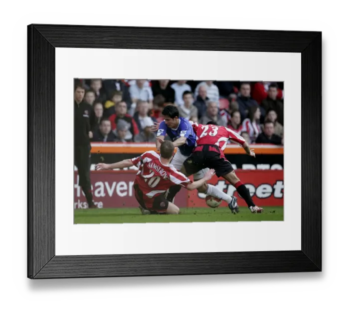 Framed Print : Mikel Arteta Faces Off Against Chris Armstrong and Ahmed Fathi: Sheffield United vs. Everton Framed Print : Mikel Arteta Faces Off Against Chris Armstrong and Ahmed Fathi: Sheffield United vs. Everton