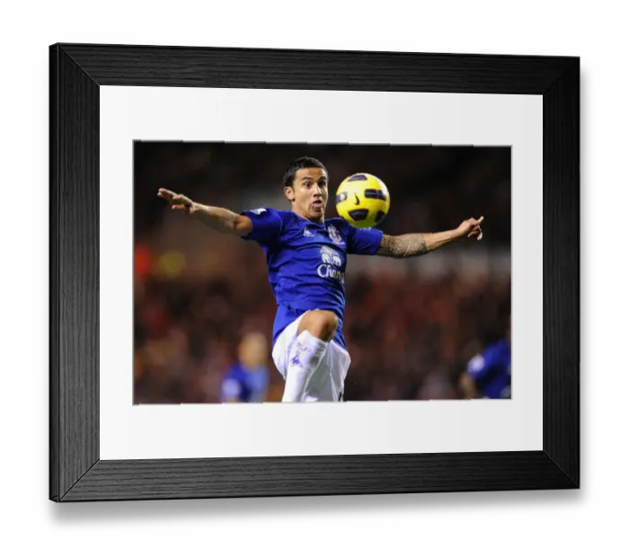 Framed Print : Everton's Tim Cahill: Unwavering Focus at Sunderland's Stadium of Light (BPL 2010) - The Moment of Shooting Framed Print : Everton's Tim Cahill: Unwavering Focus at Sunderland's Stadium of Light (BPL 2010) - The Moment of Shooting