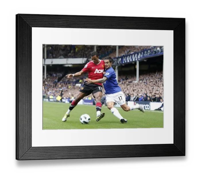 Framed Print : Tim Cahill vs Nani: A Battle for the Ball - Everton vs Manchester United (September 11, 2010, Goodison Park) Framed Print : Tim Cahill vs Nani: A Battle for the Ball - Everton vs Manchester United (September 11, 2010, Goodison Park)