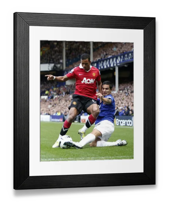 Framed Print : Battle for the Ball: Tim Cahill vs Nani - Everton vs Manchester United (September 11, 2010, Goodison Park) Framed Print : Battle for the Ball: Tim Cahill vs Nani - Everton vs Manchester United (September 11, 2010, Goodison Park)