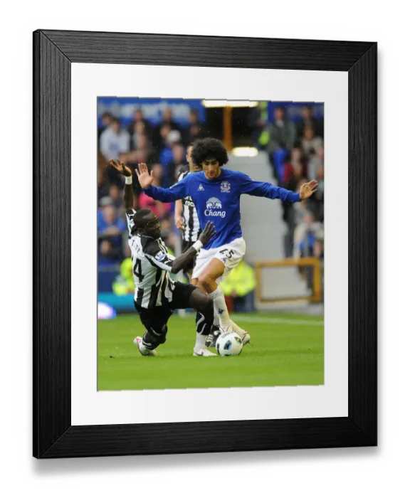 Framed Print : Fellaini vs. Tiote: A Premier League Battle - Everton vs. Newcastle United (September 18, 2010) Framed Print : Fellaini vs. Tiote: A Premier League Battle - Everton vs. Newcastle United (September 18, 2010)