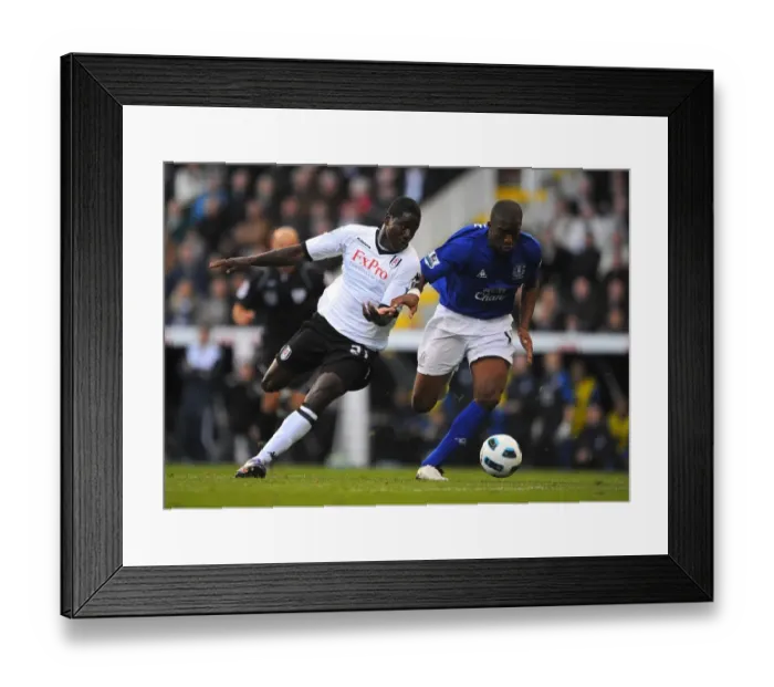 Framed Print : Clash of Champions: Distin vs. Johnson - Fulham vs. Everton, Premier League Showdown (September 25, 2010) Framed Print : Clash of Champions: Distin vs. Johnson - Fulham vs. Everton, Premier League Showdown (September 25, 2010)