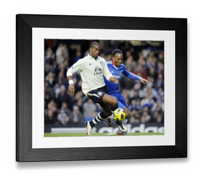 Framed Print : Clash of Titans: Distin vs. Drogba - Everton vs. Chelsea, Premier League Showdown (4 December 2010, Stamford Bridge)