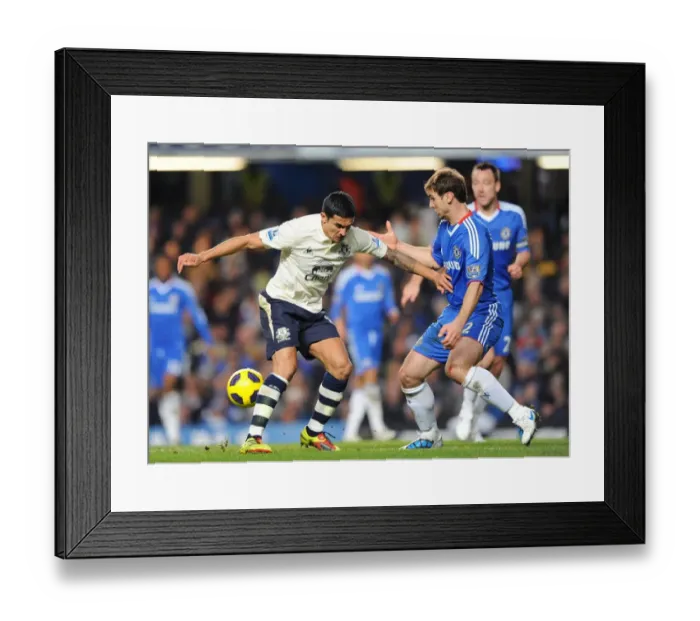 Framed Print : Clash at Stamford Bridge: Tim Cahill vs. Branislav Ivanovic - Everton vs. Chelsea (4 December 2010) Framed Print : Clash at Stamford Bridge: Tim Cahill vs. Branislav Ivanovic - Everton vs. Chelsea (4 December 2010)