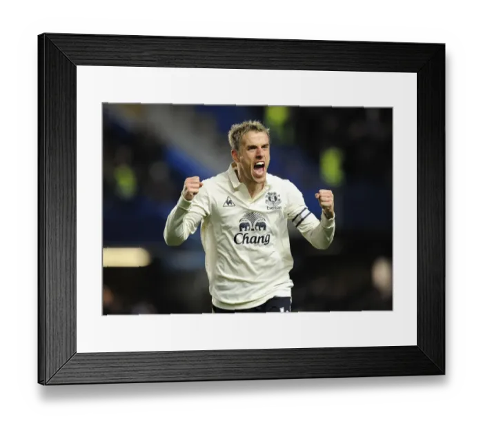 Framed Print : Euphoria Unleashed: Phil Neville's Unforgettable Reaction to Jermaine Beckford's Game-Changing Equalizer Against Chelsea (Dec 4, 2010)