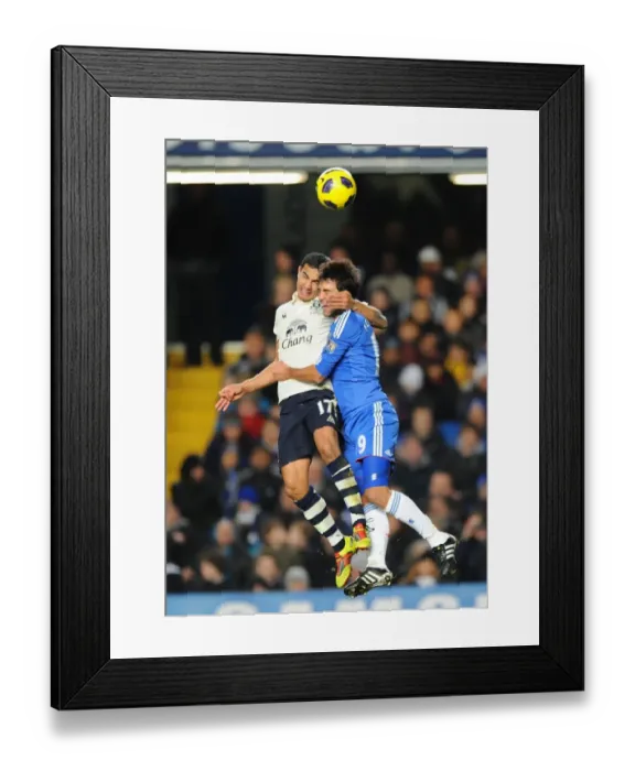 Framed Print : Tim Cahill vs. Paulo Ferreira: Premier League Battle - Everton's Clash with Chelsea (Dec. 4, 2010) Framed Print : Tim Cahill vs. Paulo Ferreira: Premier League Battle - Everton's Clash with Chelsea (Dec. 4, 2010)