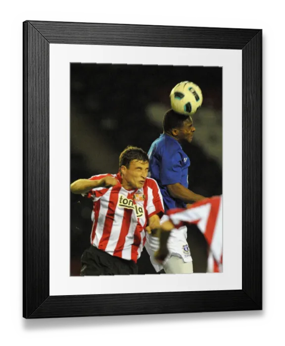Framed Print : Agard Soars High: Everton's Kieran Outjumps Sunderland's Madden Framed Print : Agard Soars High: Everton's Kieran Outjumps Sunderland's Madden
