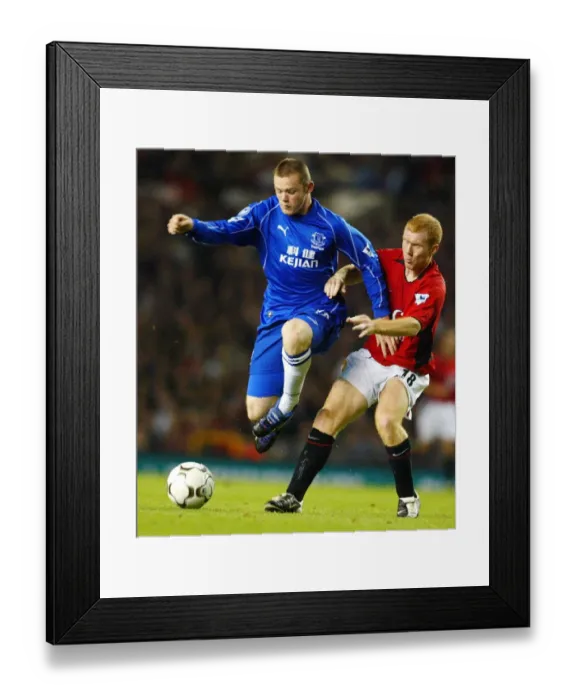 Framed Print : Clash at Old Trafford: Scholes vs Rooney - Manchester United's Iconic Rivalry Framed Print : Clash at Old Trafford: Scholes vs Rooney - Manchester United's Iconic Rivalry