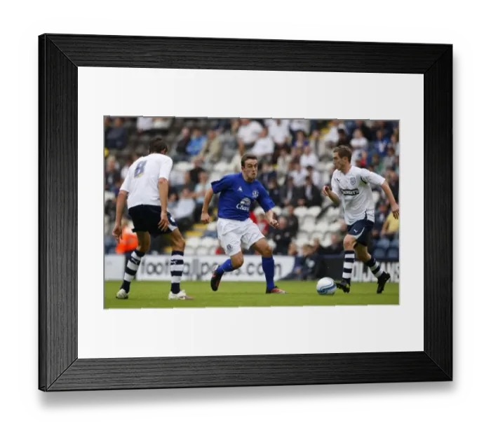 Framed Print : Jose Baxter vs. Paul Coutts and Adam Barton: Everton's Star Faces Off Against Preston North End Duo in Pre-Season Friendly