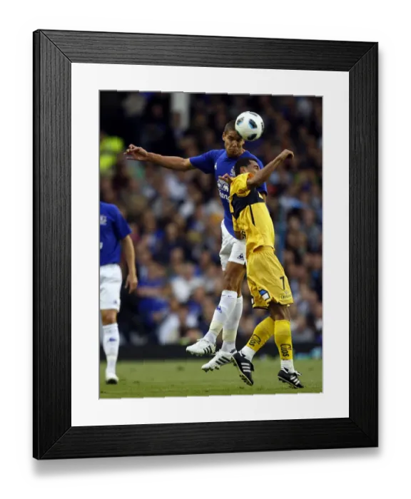 Framed Print : Intense Battle for the Ball: Rodwell vs. Heitinga at Everton Framed Print : Intense Battle for the Ball: Rodwell vs. Heitinga at Everton