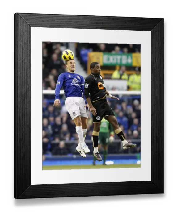 Framed Print : Phil Neville Wins Aerial Duel: Everton's Victory Over Wigan Athletic (11 December 2010, Goodison Park) Framed Print : Phil Neville Wins Aerial Duel: Everton's Victory Over Wigan Athletic (11 December 2010, Goodison Park)