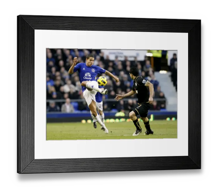 Framed Print : Jack Rodwell vs. Antolin Alcaraz: A Battle at Goodison Park, Everton vs. Wigan Athletic, Barclays Premier League (11 December 2010) Framed Print : Jack Rodwell vs. Antolin Alcaraz: A Battle at Goodison Park, Everton vs. Wigan Athletic, Barclays Premier League (11 December 2010)