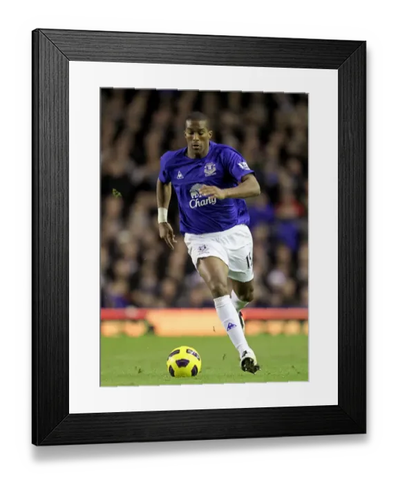 Framed Print : Decisive Moment: Sylvain Distin Scores the Game-Winning Goal for Everton Against Wigan Athletic (BPL, 11 December 2010)