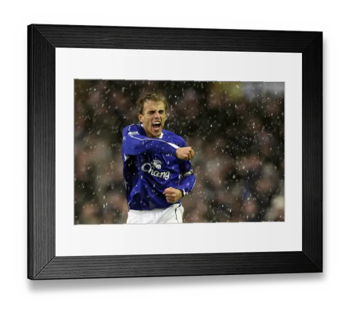 Framed Print : Everton v Arsenal - Phil Neville celebrates after Andrew Johnson