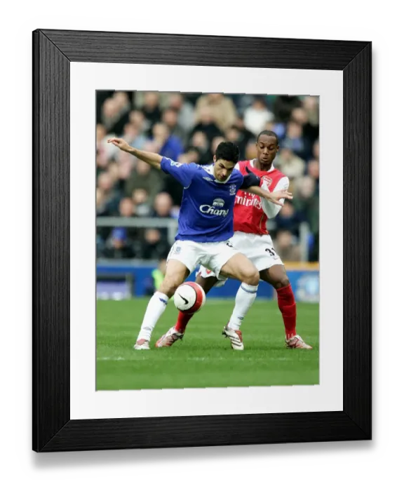 Framed Print : Mikel Arteta vs. Justin Hoyte: A Battle at Goodison Park - Everton vs. Arsenal, FA Barclays Premiership (March 18, 2007) Framed Print : Mikel Arteta vs. Justin Hoyte: A Battle at Goodison Park - Everton vs. Arsenal, FA Barclays Premiership (March 18, 2007)