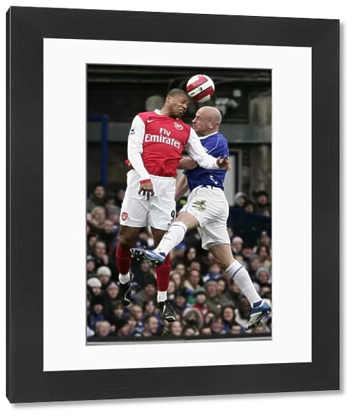 Evertons Carsley challenges Arsenals Baptista for the ball during their English Premier League soc