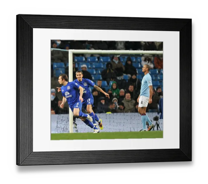 Framed Print : Everton's Double Delight: Leighton Baines and Tim Cahill Celebrate Second Goal vs. Manchester City (December 2010) Framed Print : Everton's Double Delight: Leighton Baines and Tim Cahill Celebrate Second Goal vs. Manchester City (December 2010)