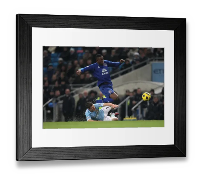 Framed Print : Clash at the City of Manchester Stadium: Anichebe vs Milner, Premier League Showdown (Manchester City vs Everton, 20 December 2010) Framed Print : Clash at the City of Manchester Stadium: Anichebe vs Milner, Premier League Showdown (Manchester City vs Everton, 20 December 2010)