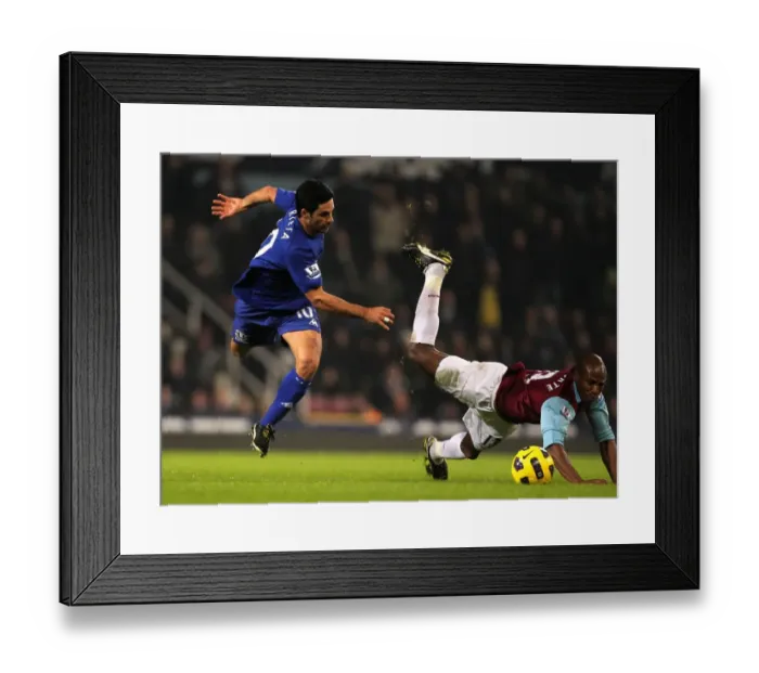 Framed Print : Battle for the Ball: Mikel Arteta vs. Luis Boa Morte - West Ham United vs. Everton, Premier League Rivalry (Upton Park, 2010) Framed Print : Battle for the Ball: Mikel Arteta vs. Luis Boa Morte - West Ham United vs. Everton, Premier League Rivalry (Upton Park, 2010)