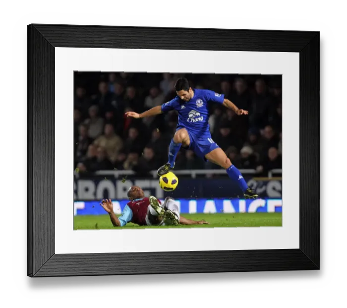 Framed Print : Intense Tackle: Mike Arteta vs. Luis Boa Morte - Barclays Premier League Clash at Upton Park (26 December 2010) Framed Print : Intense Tackle: Mike Arteta vs. Luis Boa Morte - Barclays Premier League Clash at Upton Park (26 December 2010)