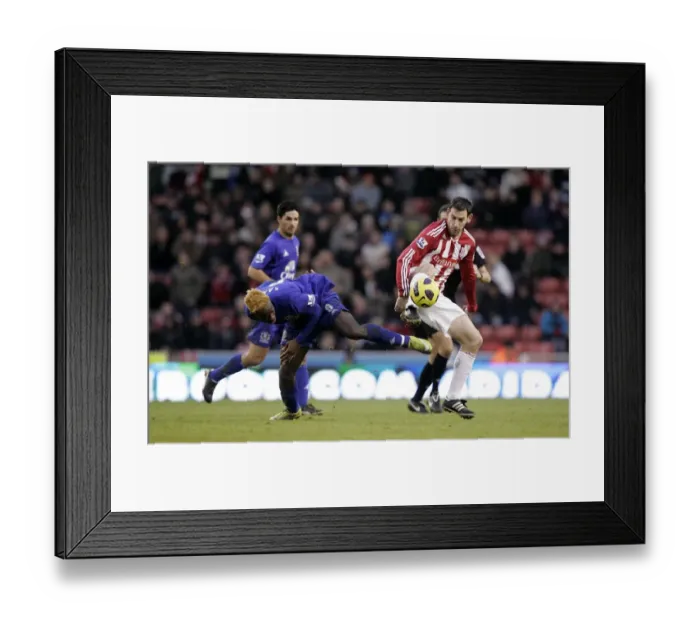 Framed Print : Clash of Titans: Saha vs Delap - Everton vs Stoke City, Premier League Showdown (01.01.2011) Framed Print : Clash of Titans: Saha vs Delap - Everton vs Stoke City, Premier League Showdown (01.01.2011)