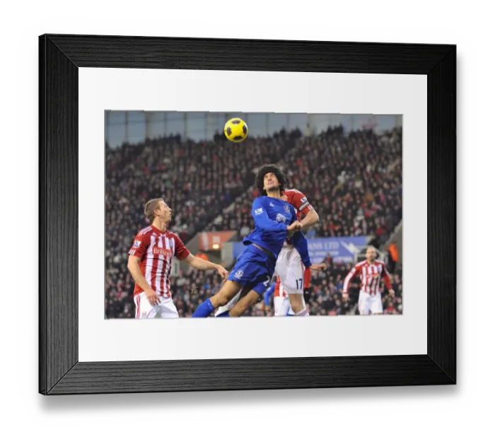 Framed Print : Intense Derby Showdown: Fellaini vs. Shawcross at Britannia Stadium (Everton vs. Stoke City, Barclays Premier League, 01 January 2011) Framed Print : Intense Derby Showdown: Fellaini vs. Shawcross at Britannia Stadium (Everton vs. Stoke City, Barclays Premier League, 01 January 2011)