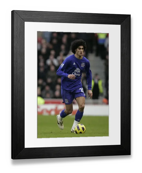 Framed Print : Marouane Fellaini in Action: Everton vs Stoke City, Barclays Premier League, Britannia Stadium (01.01.2011) Framed Print : Marouane Fellaini in Action: Everton vs Stoke City, Barclays Premier League, Britannia Stadium (01.01.2011)