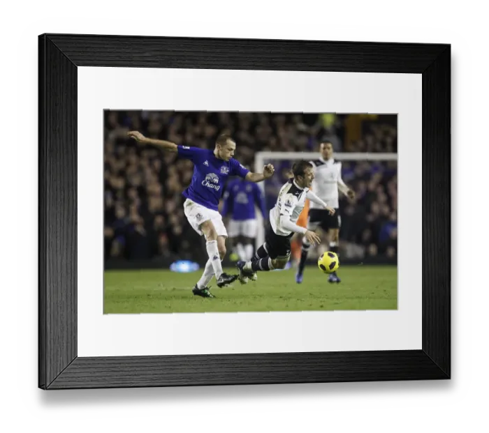 Framed Print : Intense Rivalry: Van der Vaart vs. Heitinga Battle at Goodison Park - Everton vs. Tottenham Hotspur, Barclays Premier League (05 January 2011) Framed Print : Intense Rivalry: Van der Vaart vs. Heitinga Battle at Goodison Park - Everton vs. Tottenham Hotspur, Barclays Premier League (05 January 2011)