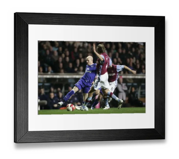 Framed Print : Aston Villa v Everton Andy Johnson in action against Olof Mellberg Framed Print : Aston Villa v Everton Andy Johnson in action against Olof Mellberg