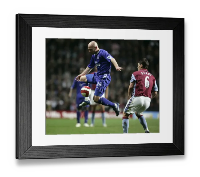 Framed Print : Aston Villa v Everton Lee Carsley in action against Gareth Barry Framed Print : Aston Villa v Everton Lee Carsley in action against Gareth Barry