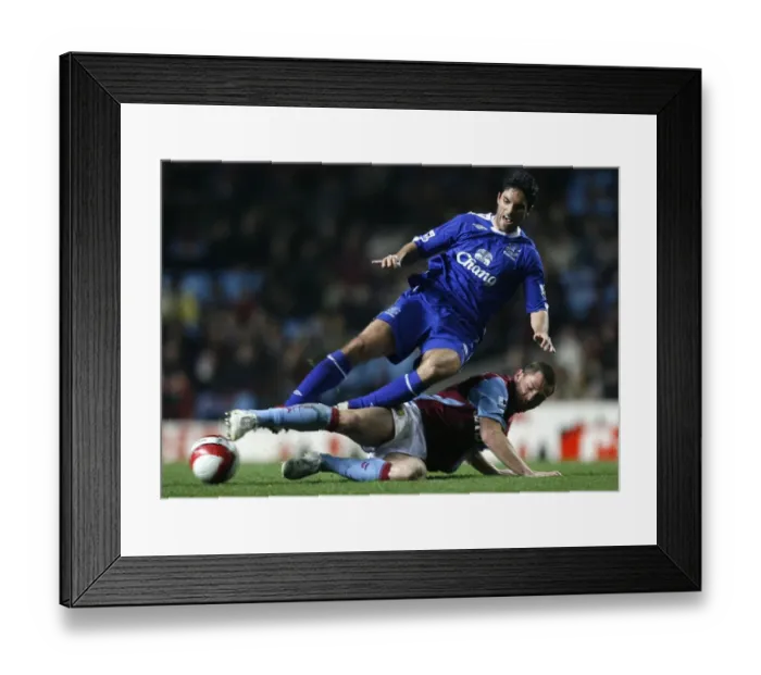 Framed Print : Aston Villas Bardsley challenges Evertons Arteta for the ball during their English Premier League Framed Print : Aston Villas Bardsley challenges Evertons Arteta for the ball during their English Premier League