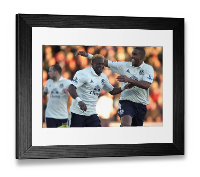 Framed Print : Everton's Saha and Distin: United in Victory - First Goal Celebration in FA Cup Clash Against Scunthorpe (January 2011)