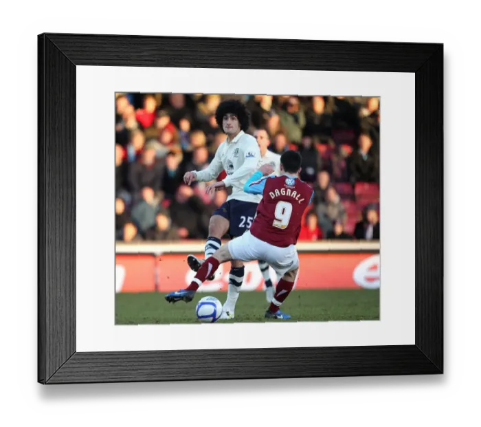 Framed Print : Everton's Fierce Battle: Marouane Fellaini vs. Chris Dagnall at Glanford Park, FA Cup Third Round Framed Print : Everton's Fierce Battle: Marouane Fellaini vs. Chris Dagnall at Glanford Park, FA Cup Third Round