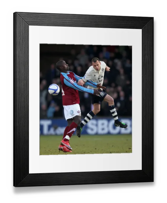 Framed Print : Battle for the Ball: Heitinga vs. Forte - FA Cup Third Round Clash between Scunthorpe United and Everton (08 January 2011) Framed Print : Battle for the Ball: Heitinga vs. Forte - FA Cup Third Round Clash between Scunthorpe United and Everton (08 January 2011)