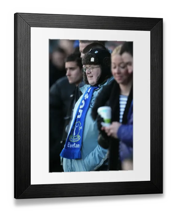 Framed Print : Wrapped Up in Blue: Everton Fan Braves Cold Weather at Scunthorpe United (FA Cup Third Round, 08 January 2011)