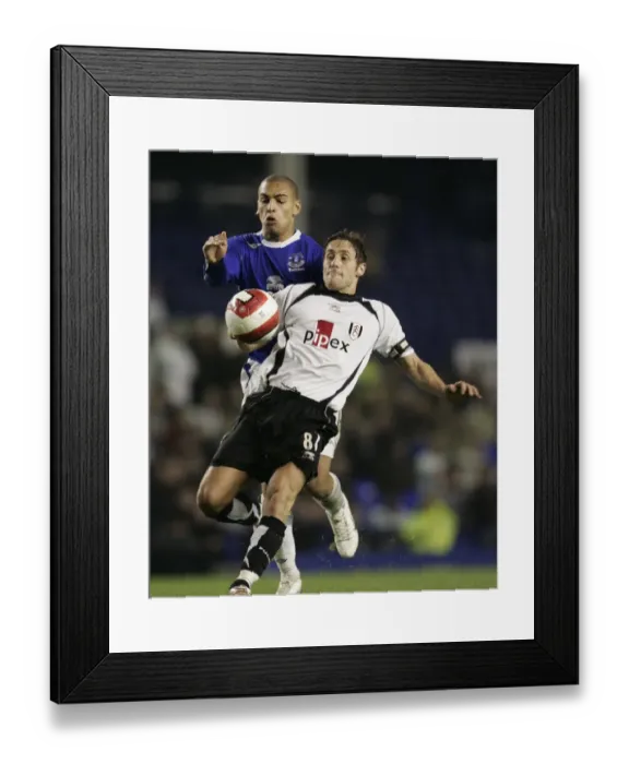 Framed Print : Everton v Fulham James Vaughan and Fulhams Michael Brown Framed Print : Everton v Fulham James Vaughan and Fulhams Michael Brown