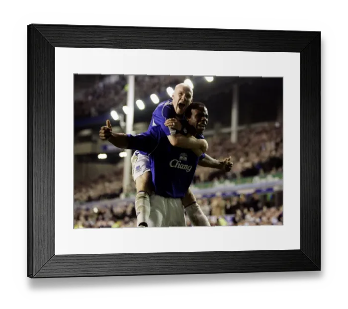 Framed Print : Everton v Fulham Victor Anichebe celebrates his goal with Andrew Johnson