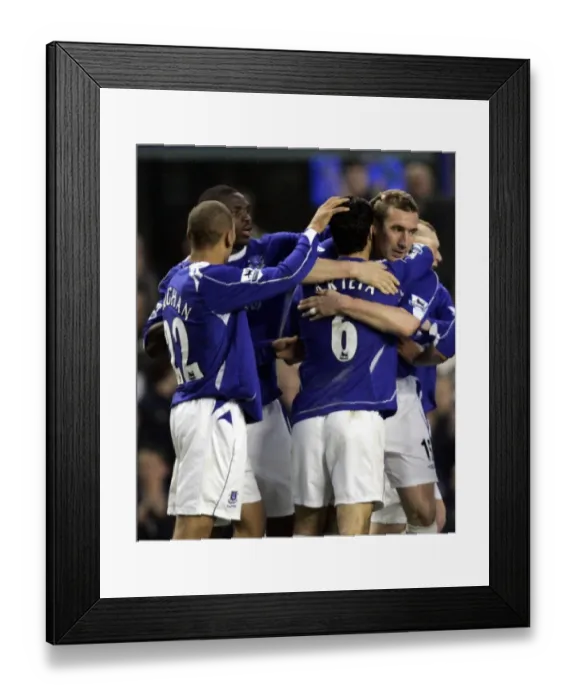 Framed Print : Everton v Fulham Alan Stubbs celebrates his goal for 2-1