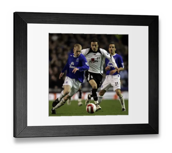 Framed Print : Everton v Fulham Tony Hibbert in action against Simon Davies Framed Print : Everton v Fulham Tony Hibbert in action against Simon Davies