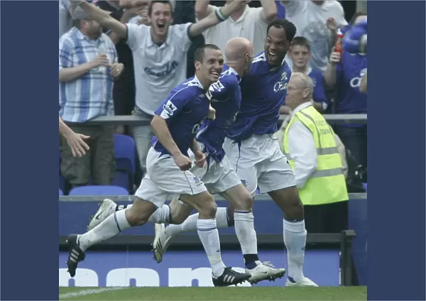 Everton v Charlton Athletic Joloeon Lescott celebrates scoring the first goal