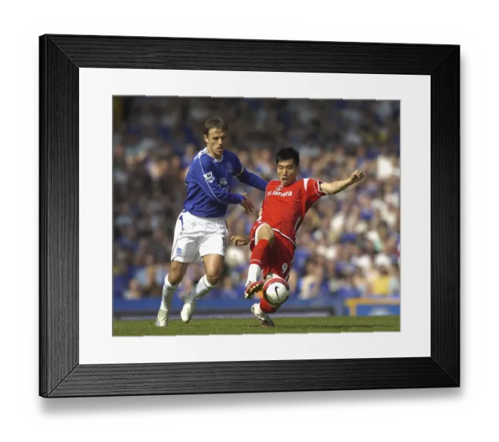Framed Print : Everton v Charlton Athletic Phil Neville and Zheng Zhi Framed Print : Everton v Charlton Athletic Phil Neville and Zheng Zhi