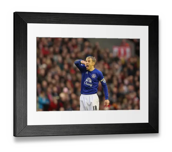 Framed Print : Phil Neville at Anfield: Intense Rivalry in Liverpool vs. Everton (16 January 2011) Framed Print : Phil Neville at Anfield: Intense Rivalry in Liverpool vs. Everton (16 January 2011)