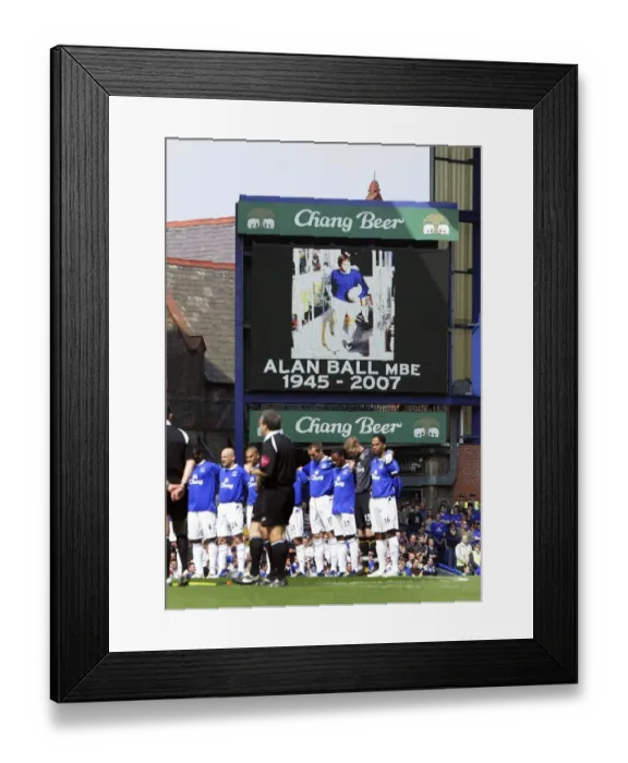 Framed Print : Everton v Manchester United The Everton team line up during a minutes silence for Alan Ball
