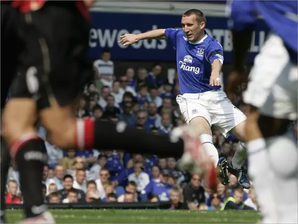 Evertons Stubbs shoots to score during their English Premier League soccer match against Manchester