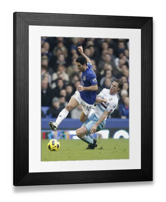Framed Print : Intense Rivalry: Arteta vs. Parker - A Battle for Ball Possession (Everton vs. West Ham United, Barclays Premier League, 2011) Framed Print : Intense Rivalry: Arteta vs. Parker - A Battle for Ball Possession (Everton vs. West Ham United, Barclays Premier League, 2011)