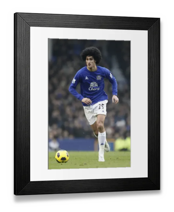Framed Print : Marouane Fellaini: Thunderous Performance at Goodison Park - Everton vs. West Ham United, Barclays Premier League (22 January 2011) Framed Print : Marouane Fellaini: Thunderous Performance at Goodison Park - Everton vs. West Ham United, Barclays Premier League (22 January 2011)