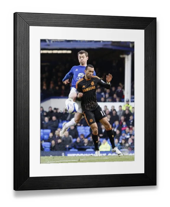 Framed Print : A Clash of Blues: Everton's Bilyaletdinov vs Chelsea's Bosingwa - FA Cup Fourth Round, Goodison Park (2011) Framed Print : A Clash of Blues: Everton's Bilyaletdinov vs Chelsea's Bosingwa - FA Cup Fourth Round, Goodison Park (2011)