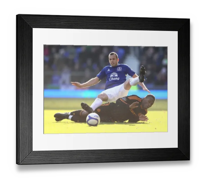 Framed Print : Heating Up the Pitch: A Battle Between Heitinga and Drogba - Everton vs. Chelsea FA Cup Fourth Round Clash (29 January 2011) Framed Print : Heating Up the Pitch: A Battle Between Heitinga and Drogba - Everton vs. Chelsea FA Cup Fourth Round Clash (29 January 2011)